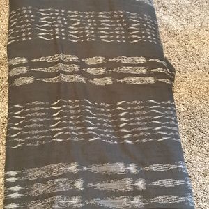 Girasol charcoal Ikat baby wrap. Handwoven cotton.